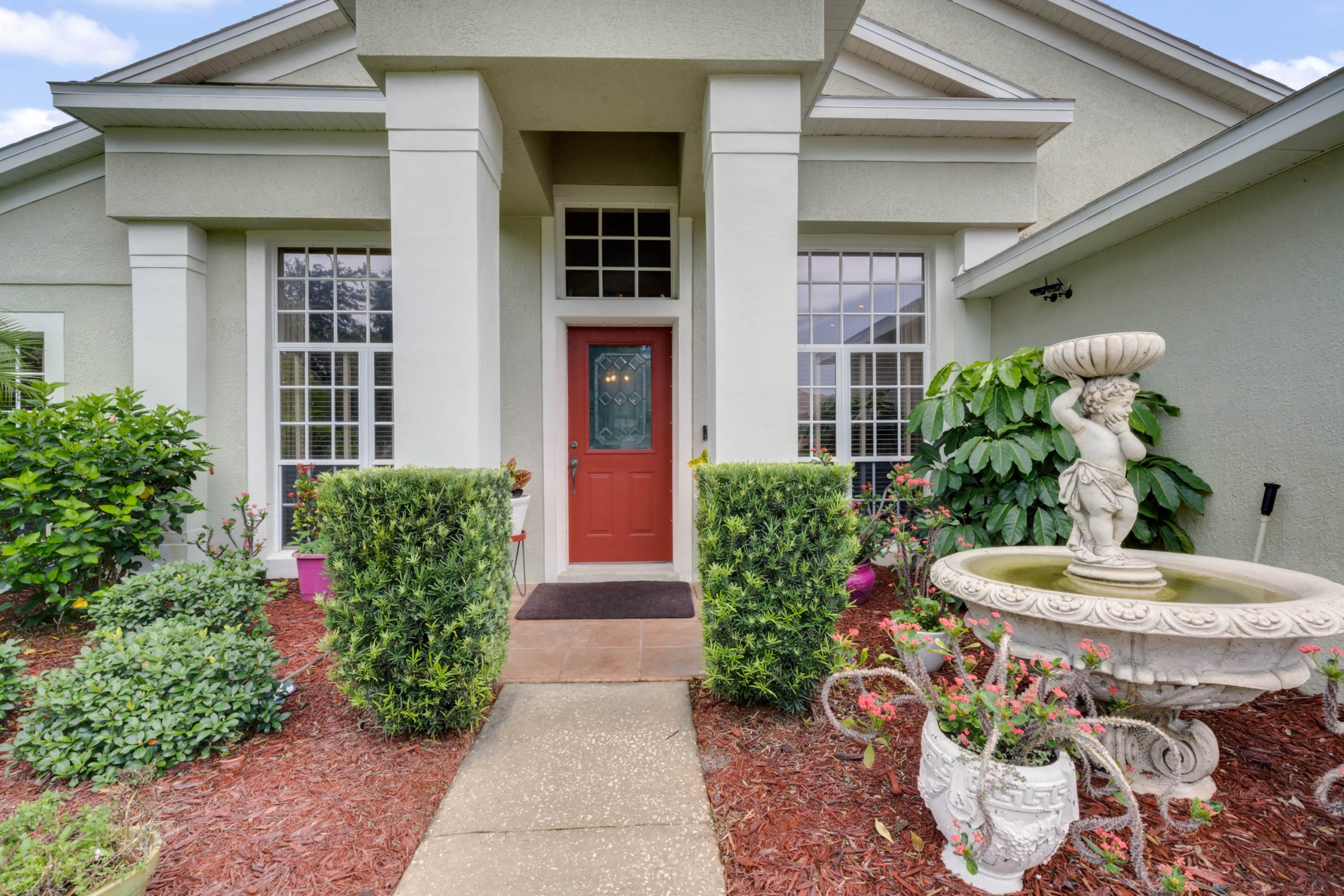 House with a red front door.